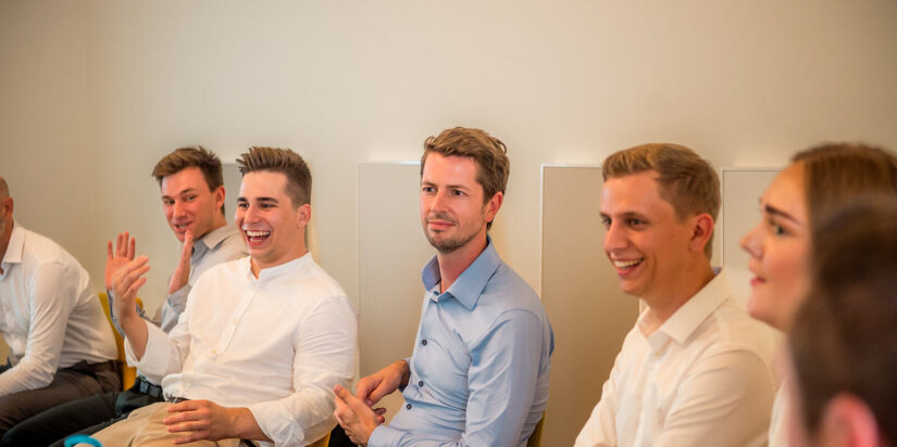 Chronion team in a team meeting with everyone